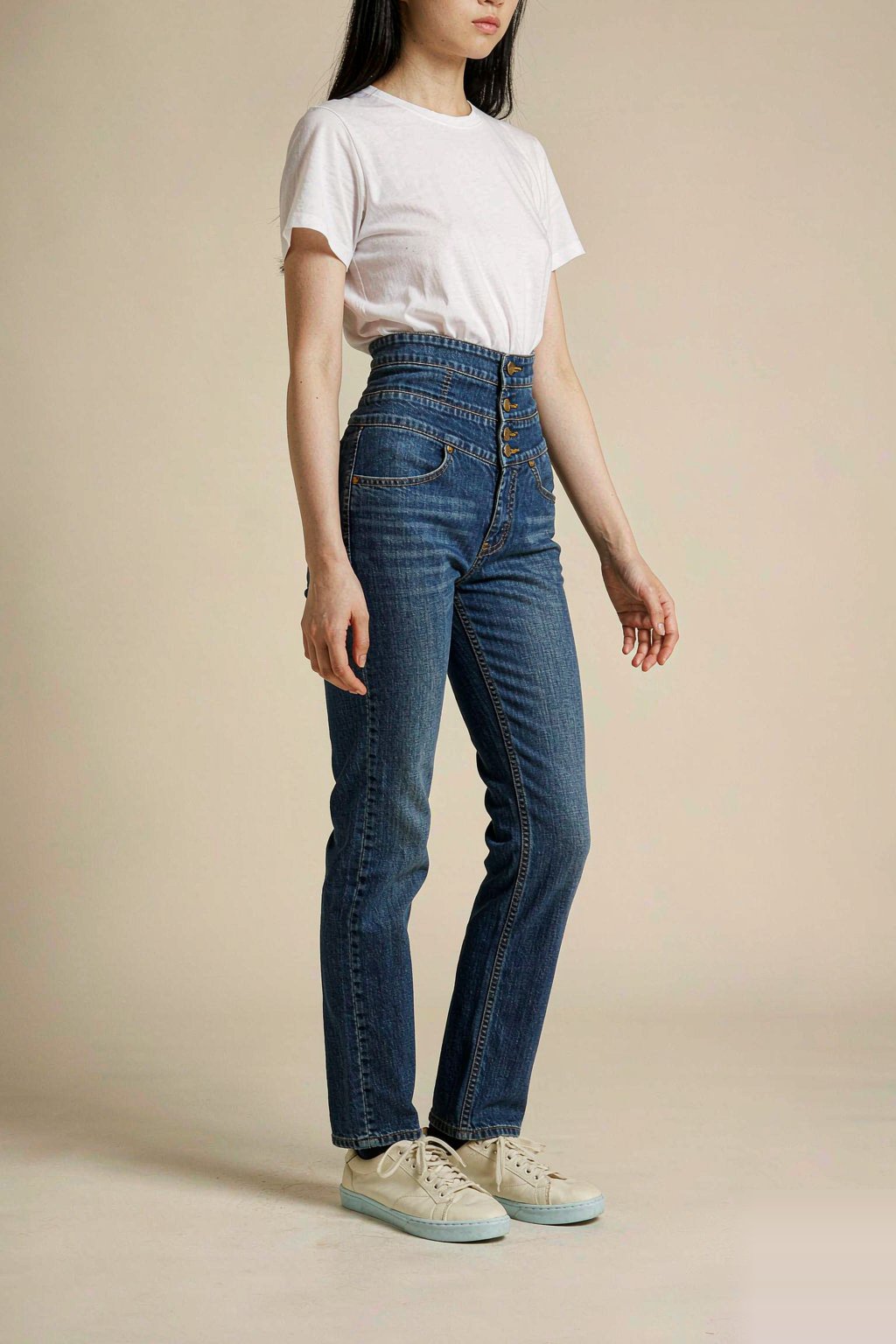 Contact Bentleys Denim Model wearing high-waisted jeans
