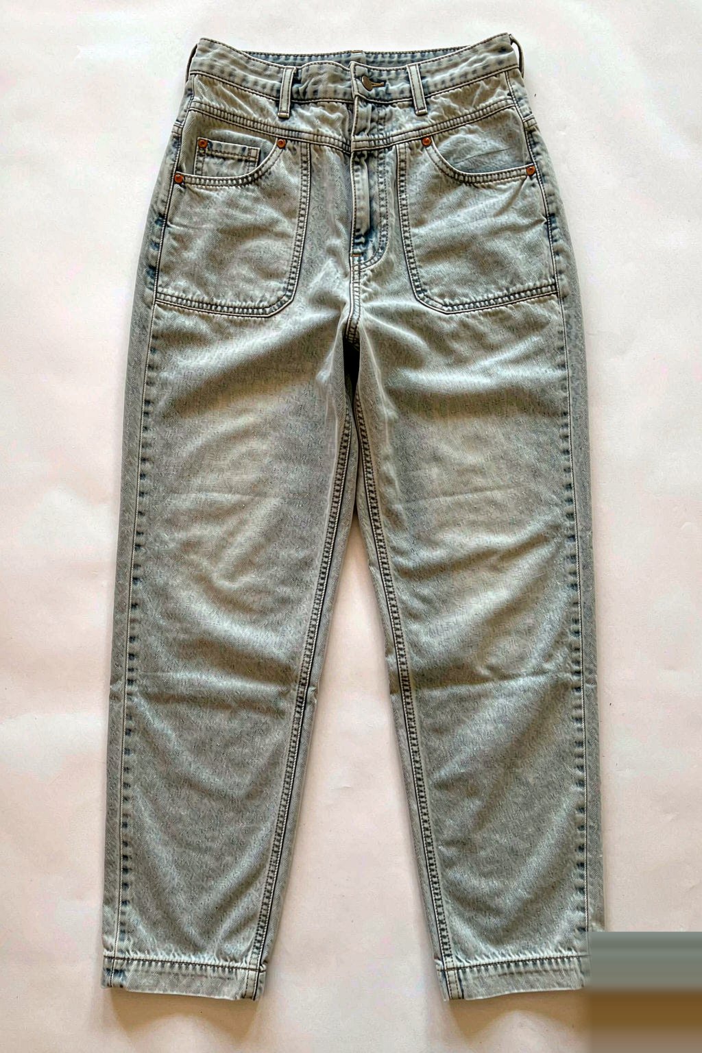 The Eight Fits The Mom Jean — Stonewash laid flat, showing the leg opening and rise