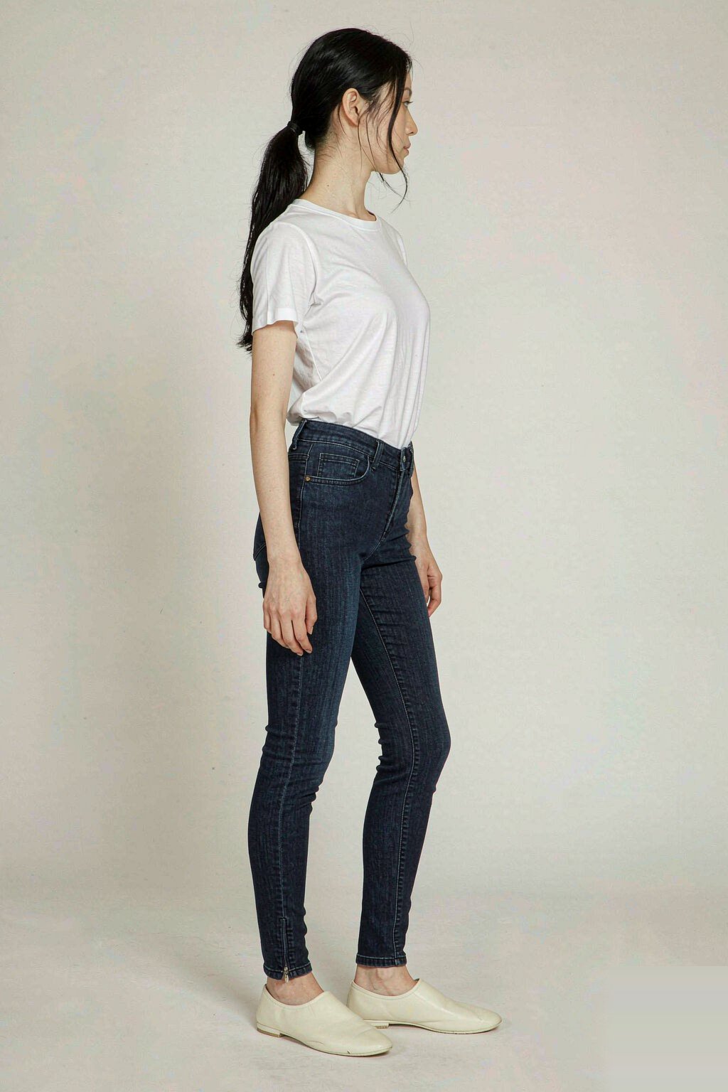 The Mid-Rise Skinny Jean — Dark Indigo The Mid-Rise Skinny Jean — Dark Indigo seen from the side