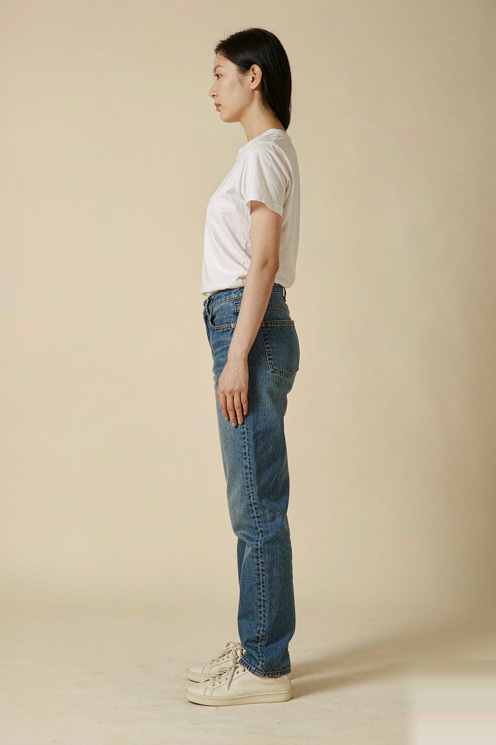 The Classic Straight Jean — Mid Blue The Classic Straight Jean — Mid Blue seen from the side